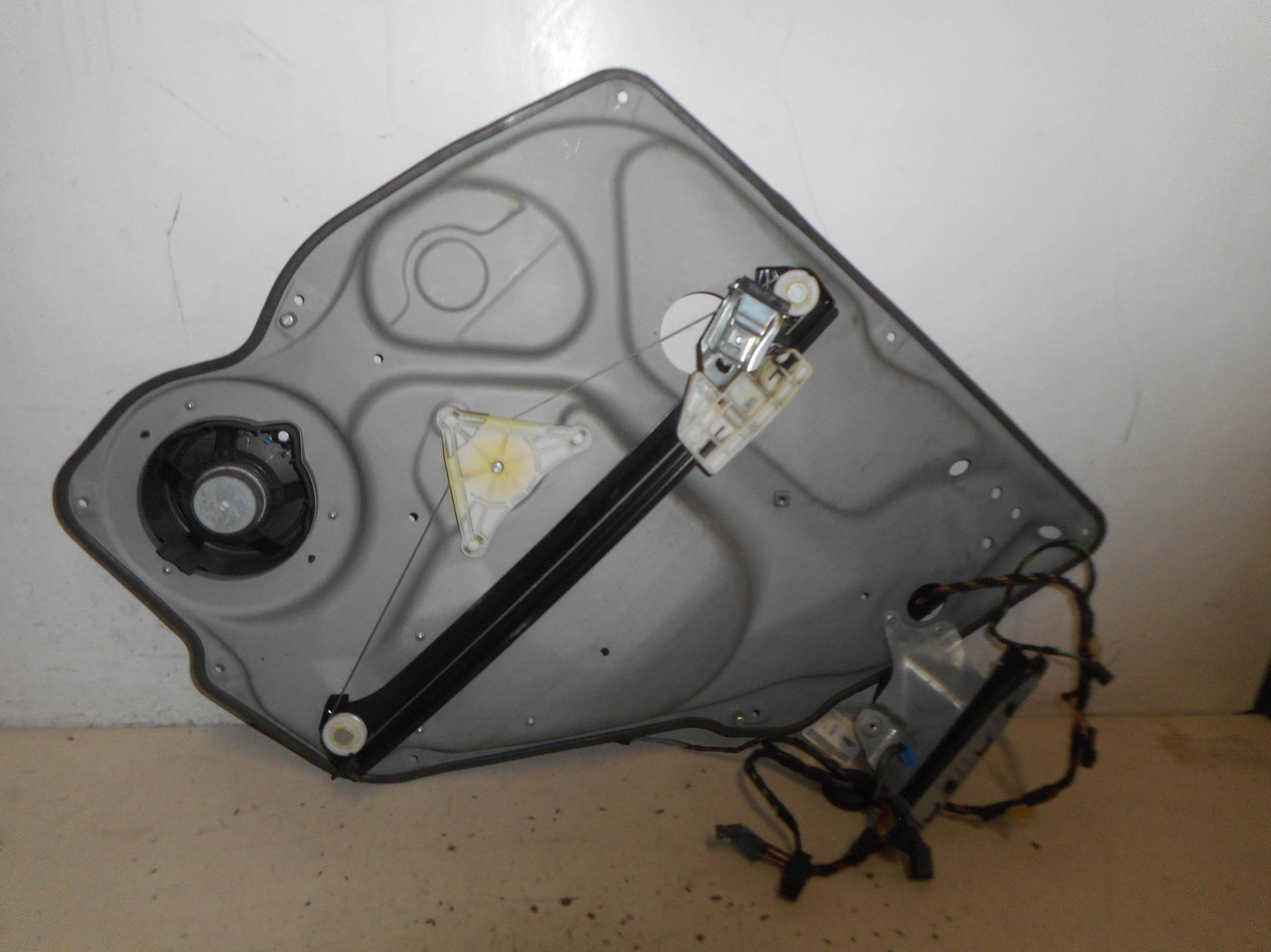 Alzacristallo elettr. porta post. sx.